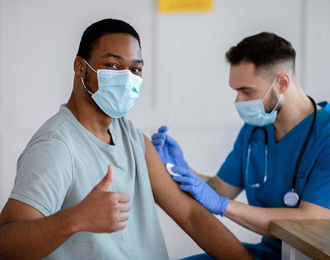 man getting vaccine